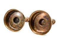 A Near Pair of Dutch William and Mary Brass Bell-Bottom Candlesticks