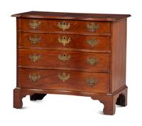 A Chippendale Carved Mahogany Reverse Serpentine Chest of Drawers, 18th Century