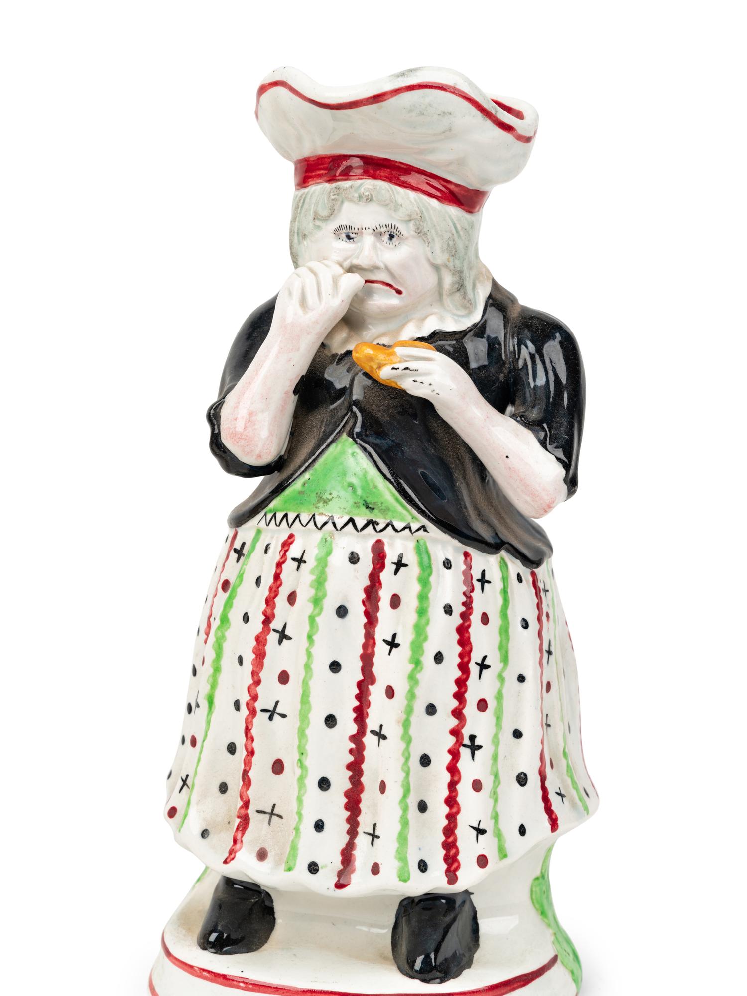 A "Scottish Farmer" Toby Jug and a "Lady Snuff Taker" Toby Jug