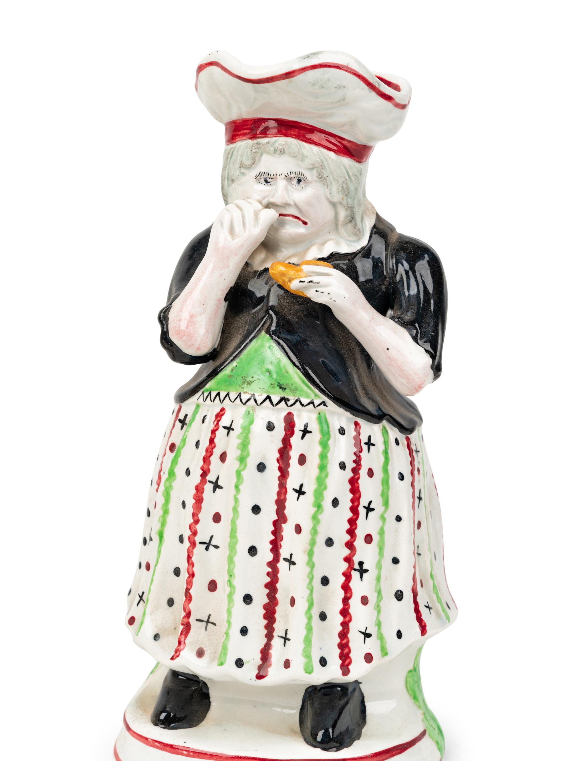 A "Scottish Farmer" Toby Jug and a "Lady Snuff Taker" Toby Jug