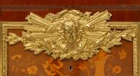 A Louis XVI Style Gilt Bronze Mounted Marquetry Commode