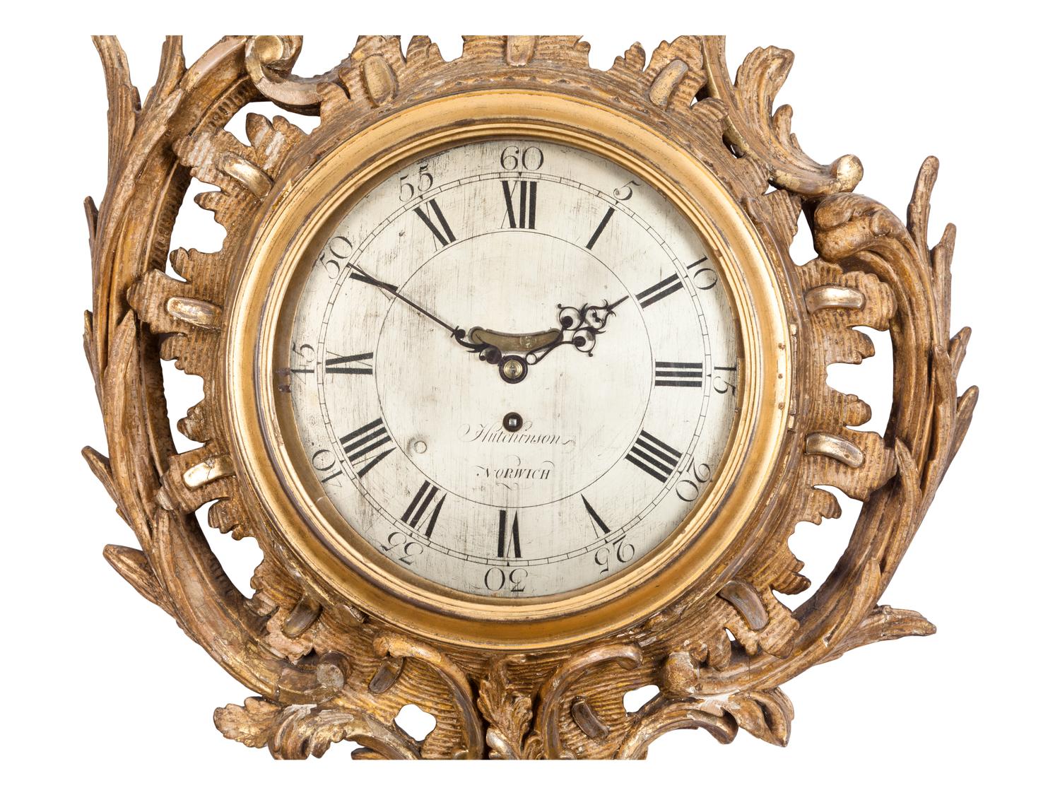 A George II Carved Giltwood Cartel Clock