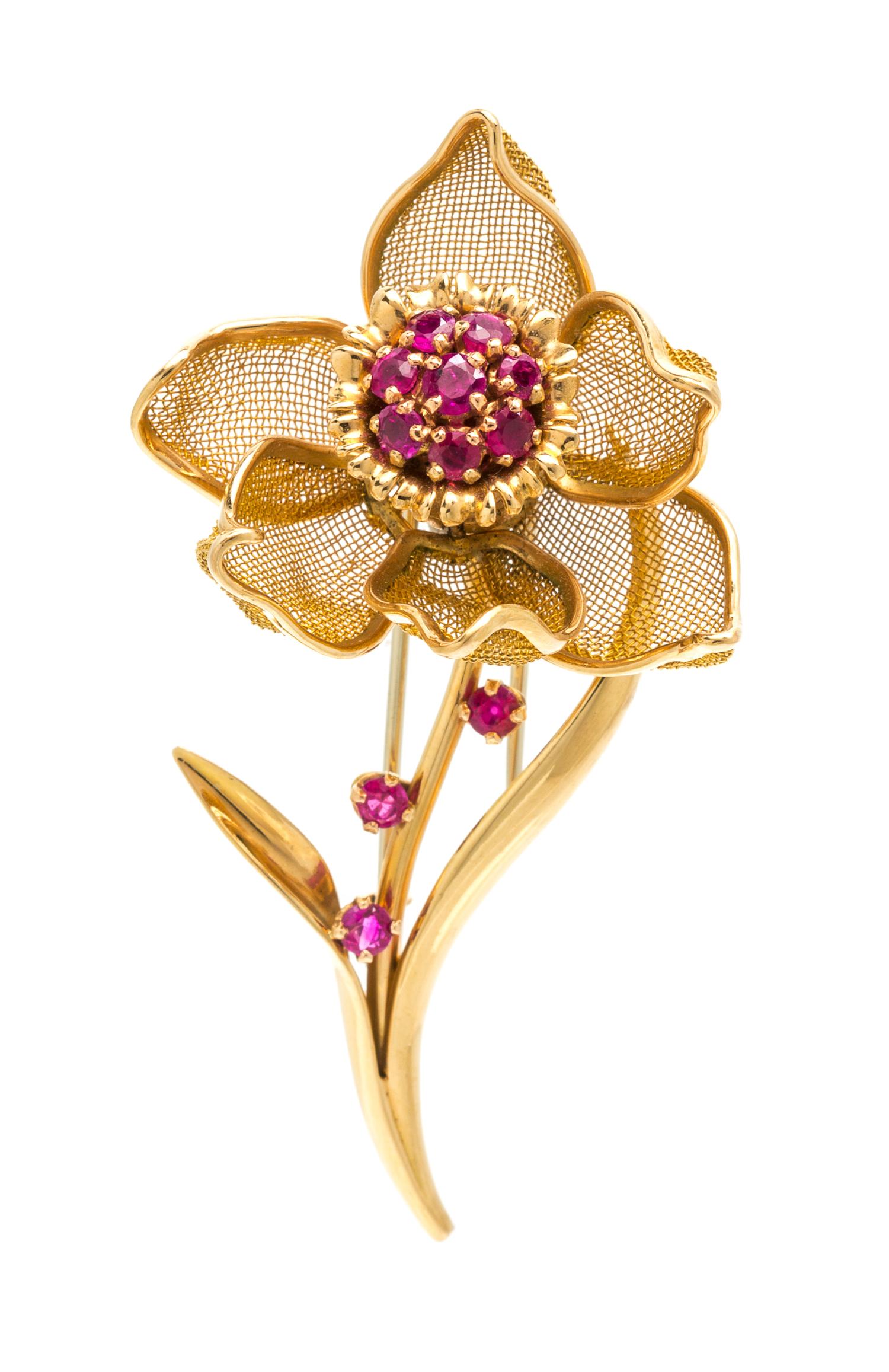 An 18 Karat Yellow Gold and Ruby Articulated Flower Brooch, French, 15.60 dwts.
