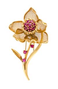 An 18 Karat Yellow Gold and Ruby Articulated Flower Brooch, French, 15.60 dwts.