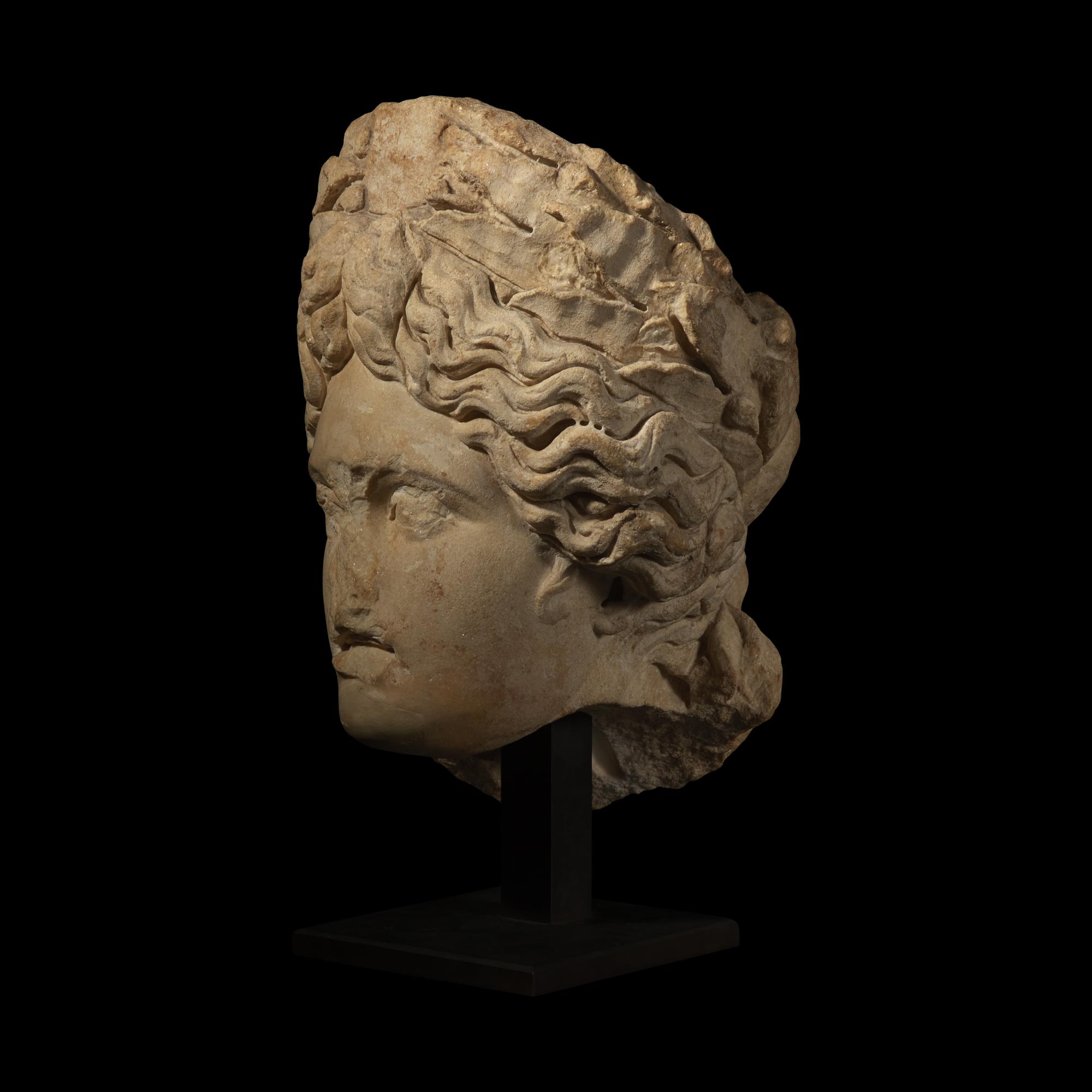 A Roman Marble Head of Apollo Citharoedus
