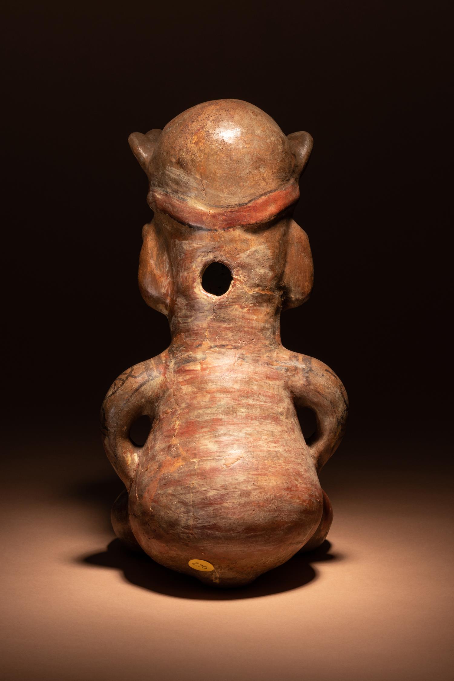 A Nicoya Polychrome Terracotta Seated Figure
