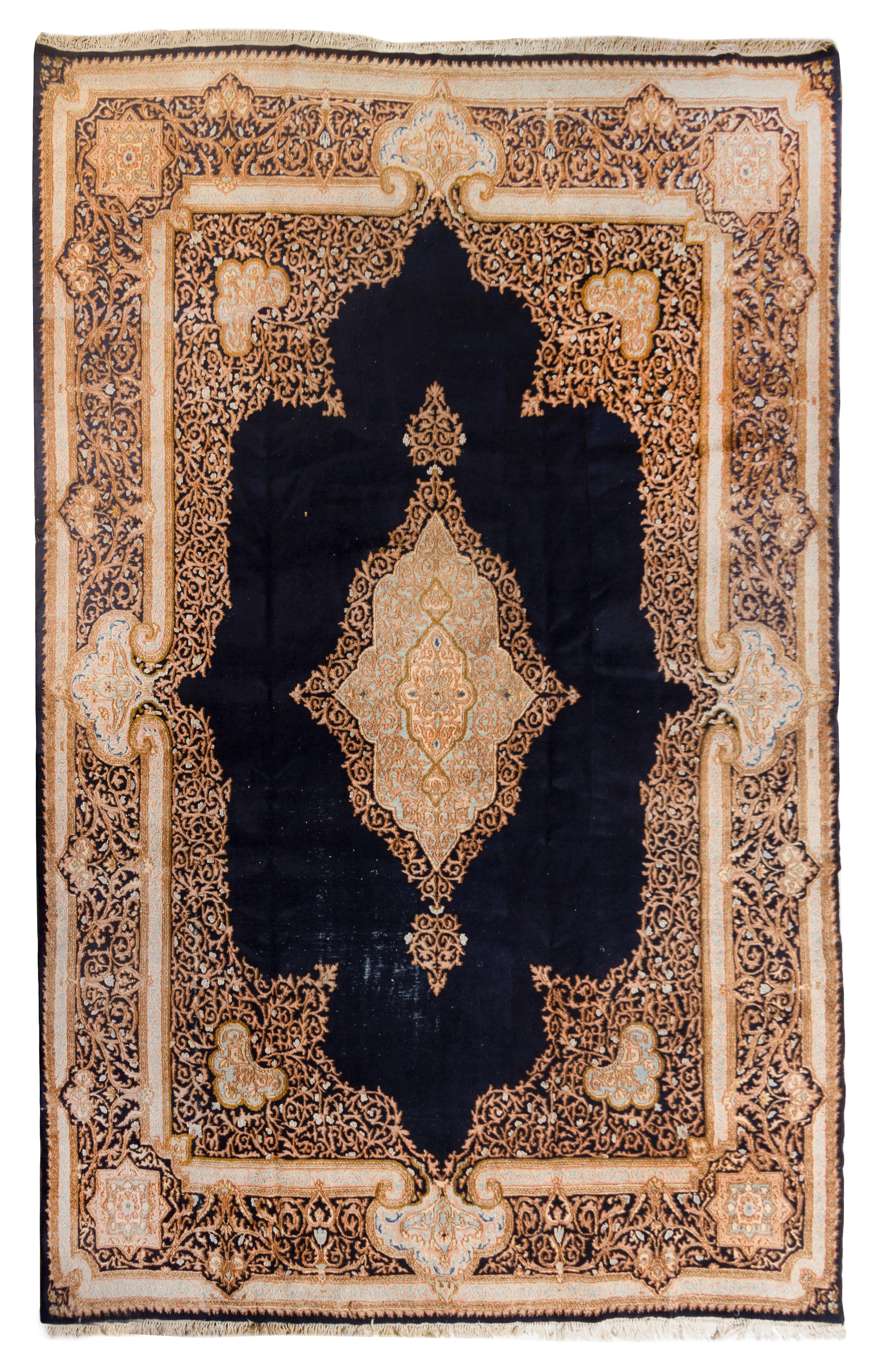 A Persian Wool Rug 12 feet 2 inches x 8 feet 11 1/4 inches.