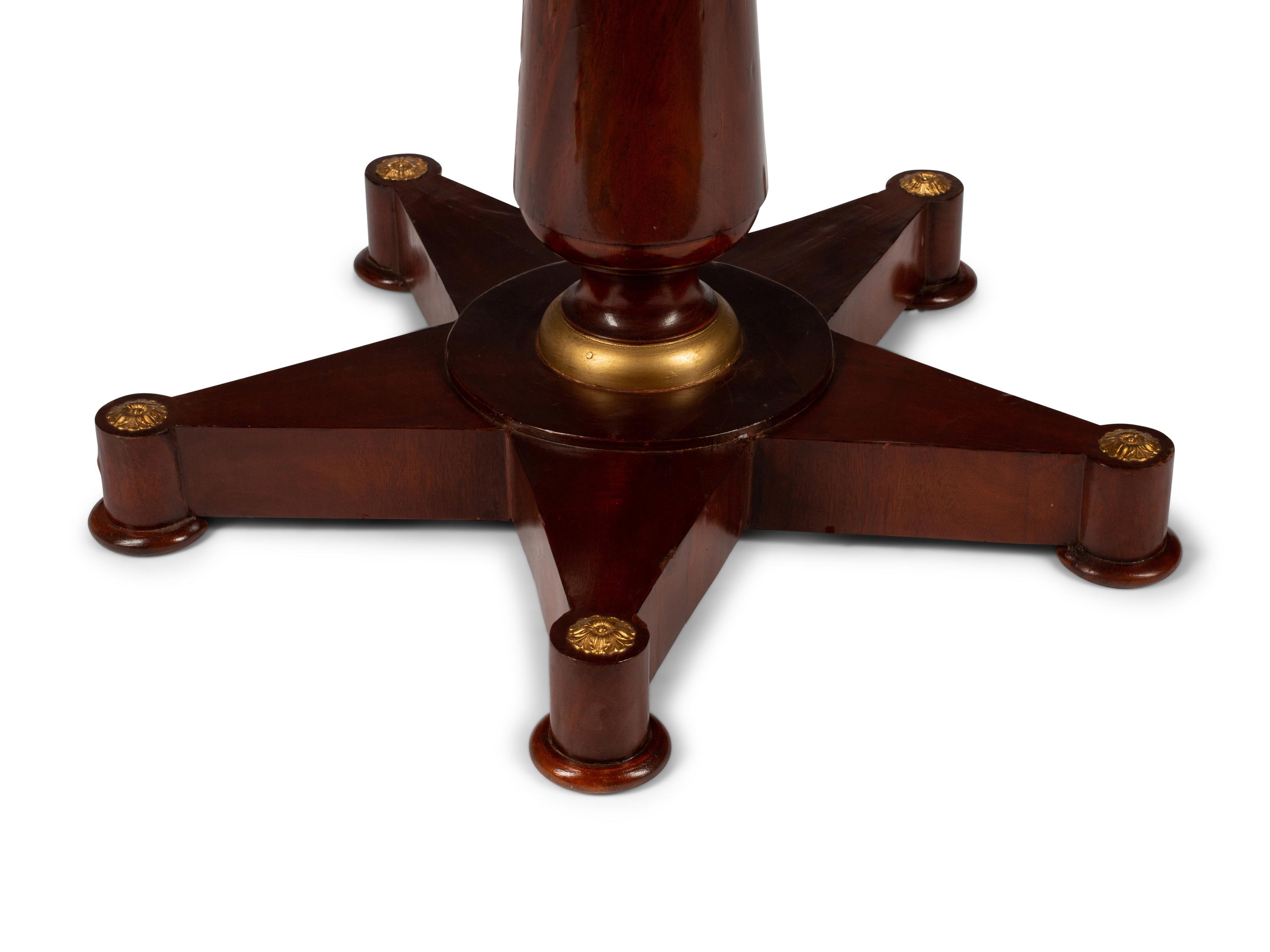 An Empire Style Mahogany Table with a Specimen Marble Top