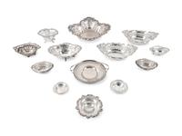 A Large Group of American Pierced Silver Dishes