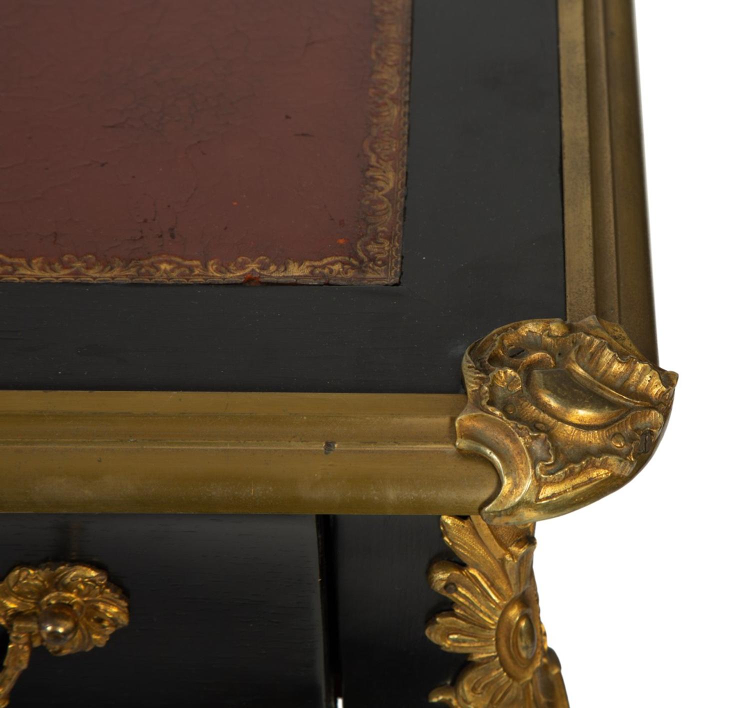 A Regence Style Gilt Bronze Mounted Ebonized Bureau Plat — LATE 19TH CENTURY