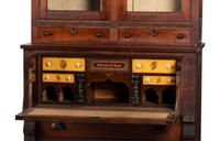 A Walnut and Curly Maple Desk and Bookcase by Jacob Werrey (1838-1893)