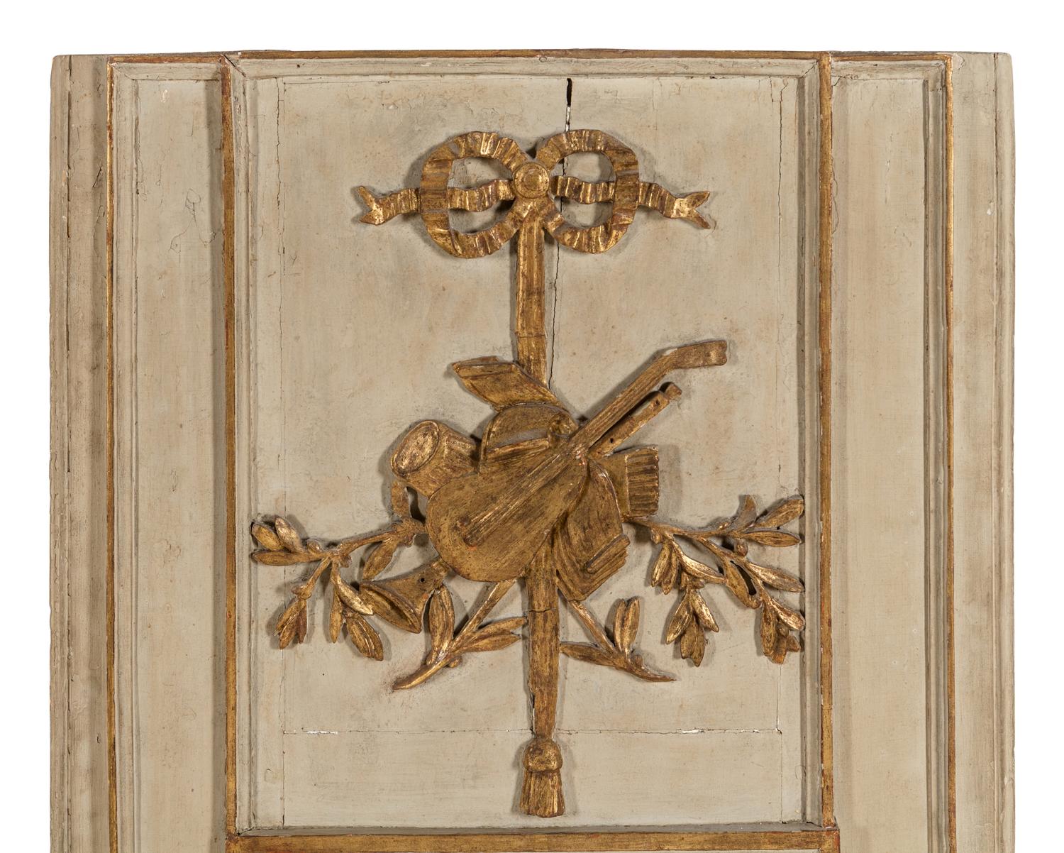 A Louis XVI Style Gray Painted and Parcel Gilt Mirror