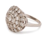 A 14 Karat White Gold and Diamond Ring,