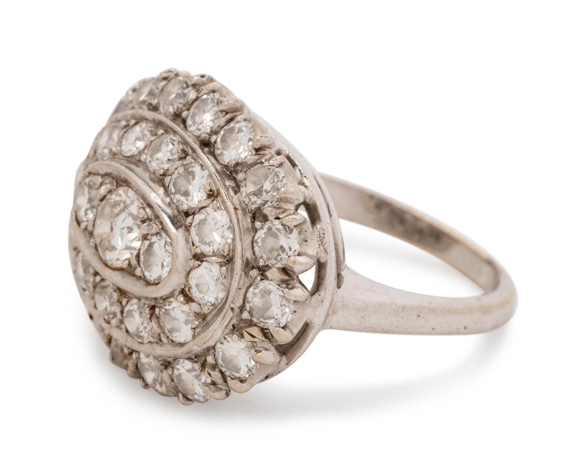 A 14 Karat White Gold and Diamond Ring,