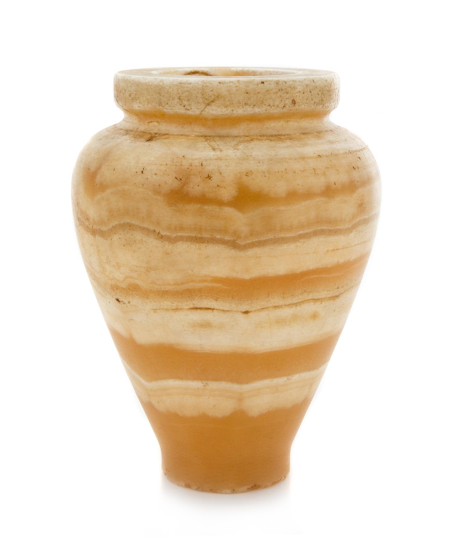 An Egyptian Banded Alabaster Vase or Canopic Jar Height 7 1/4 inches. — CIRCA 2300 B.C.E.