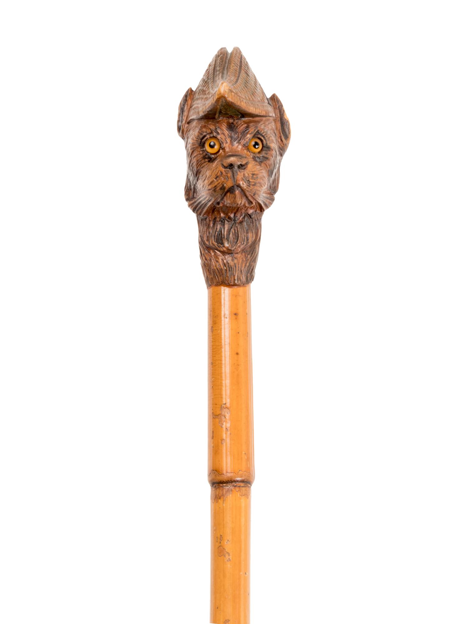 Four Figural Carved Wood Walking Sticks