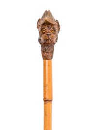 Four Figural Carved Wood Walking Sticks