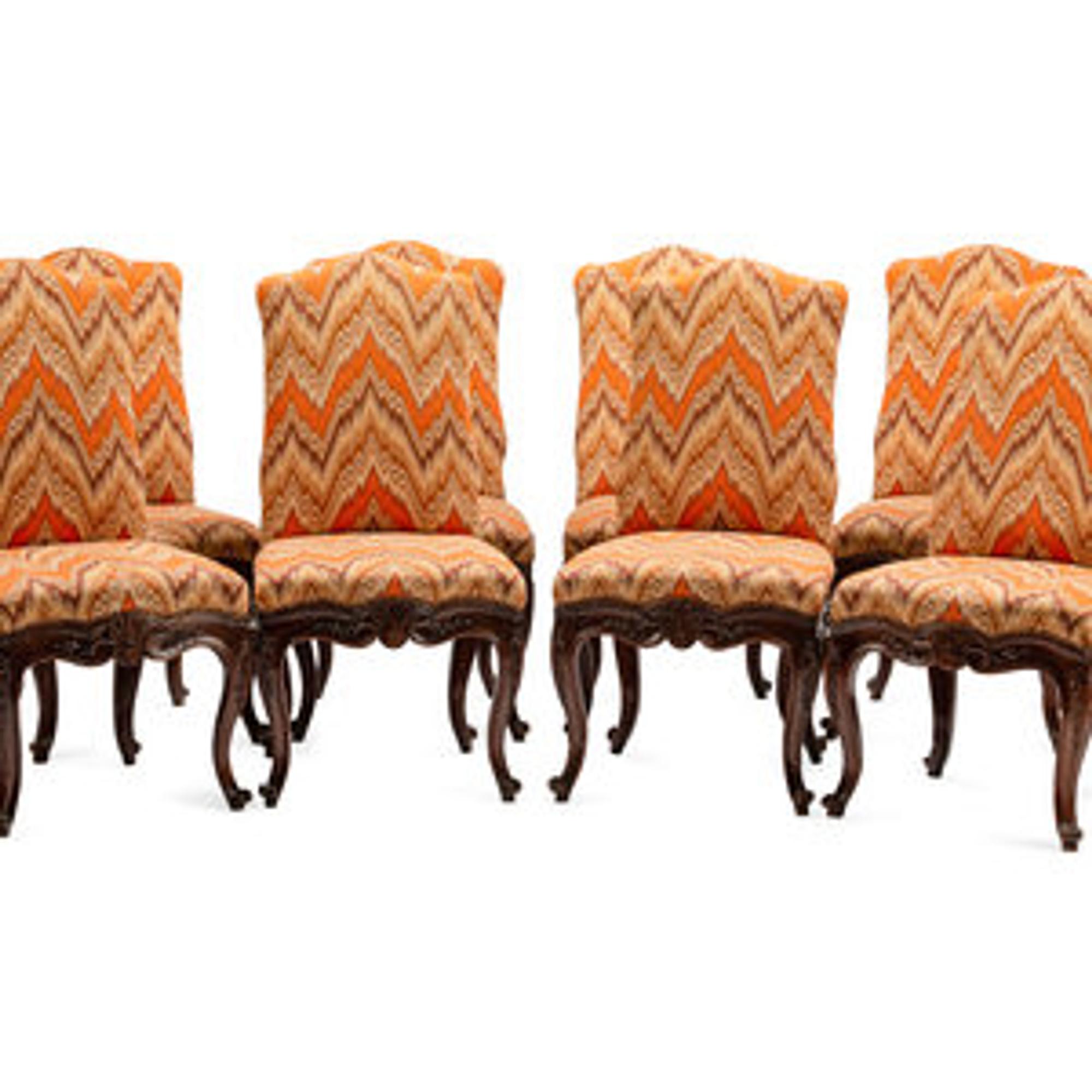 A Set of Eight Continental Carved Walnut Dining Chairs — LATE 18TH/EARLY 19TH CENTURY