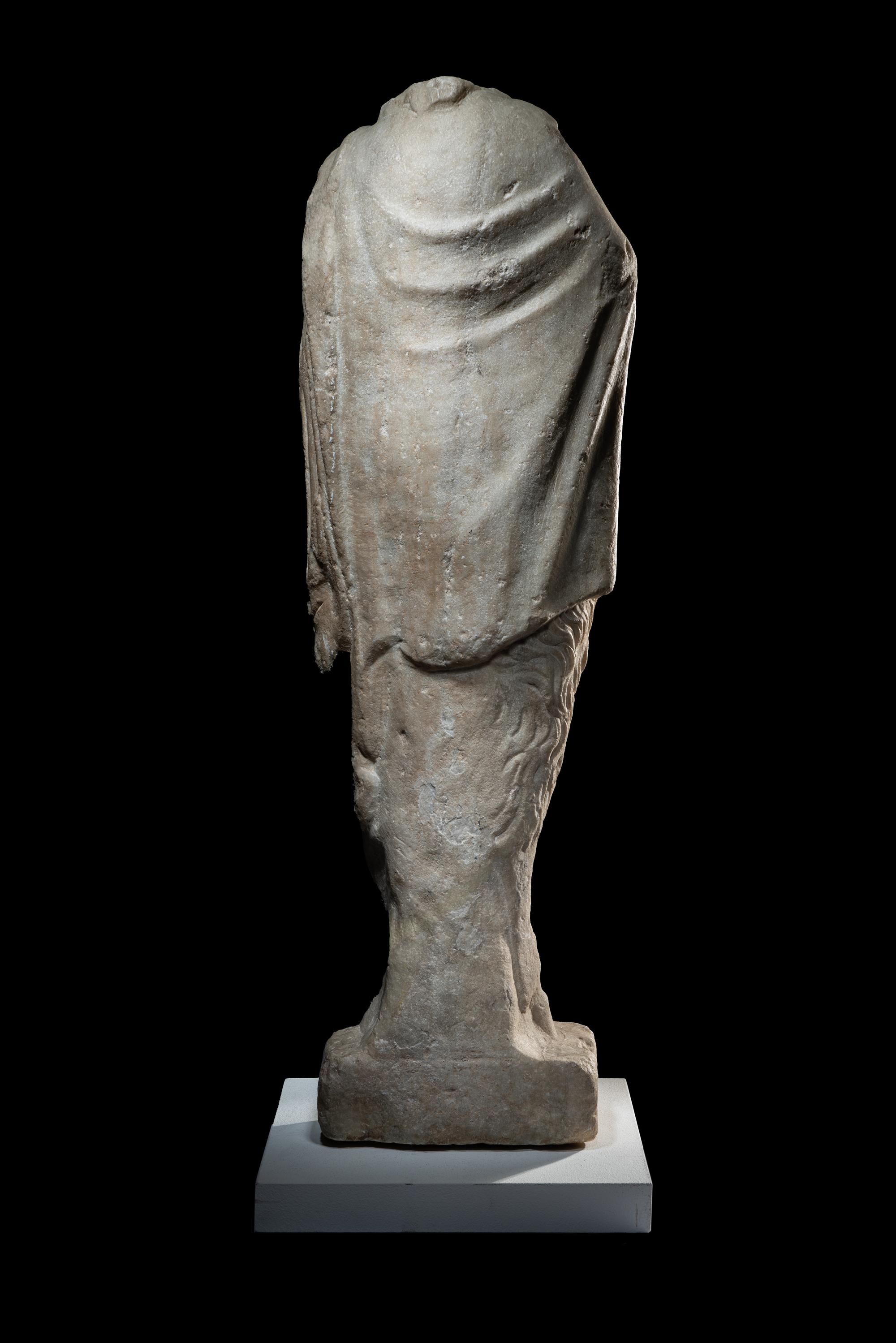 A Roman Marble Statue of Pan Holding Pipes