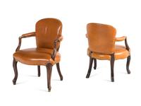A Near Pair of George III Mahogany Leather-Upholstered Armchairs