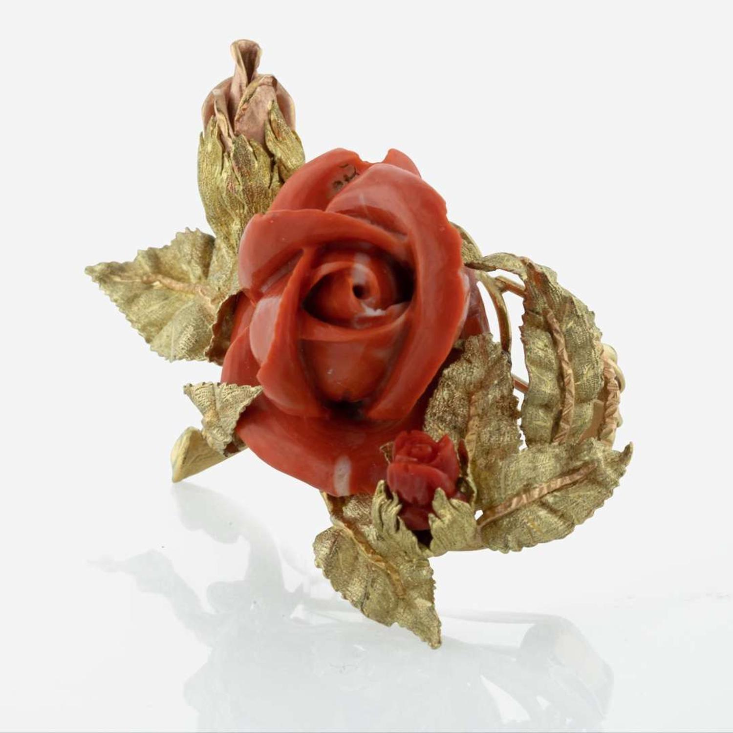 A Two-Tone Yellow and Rose Gold Carved Coral Pendant