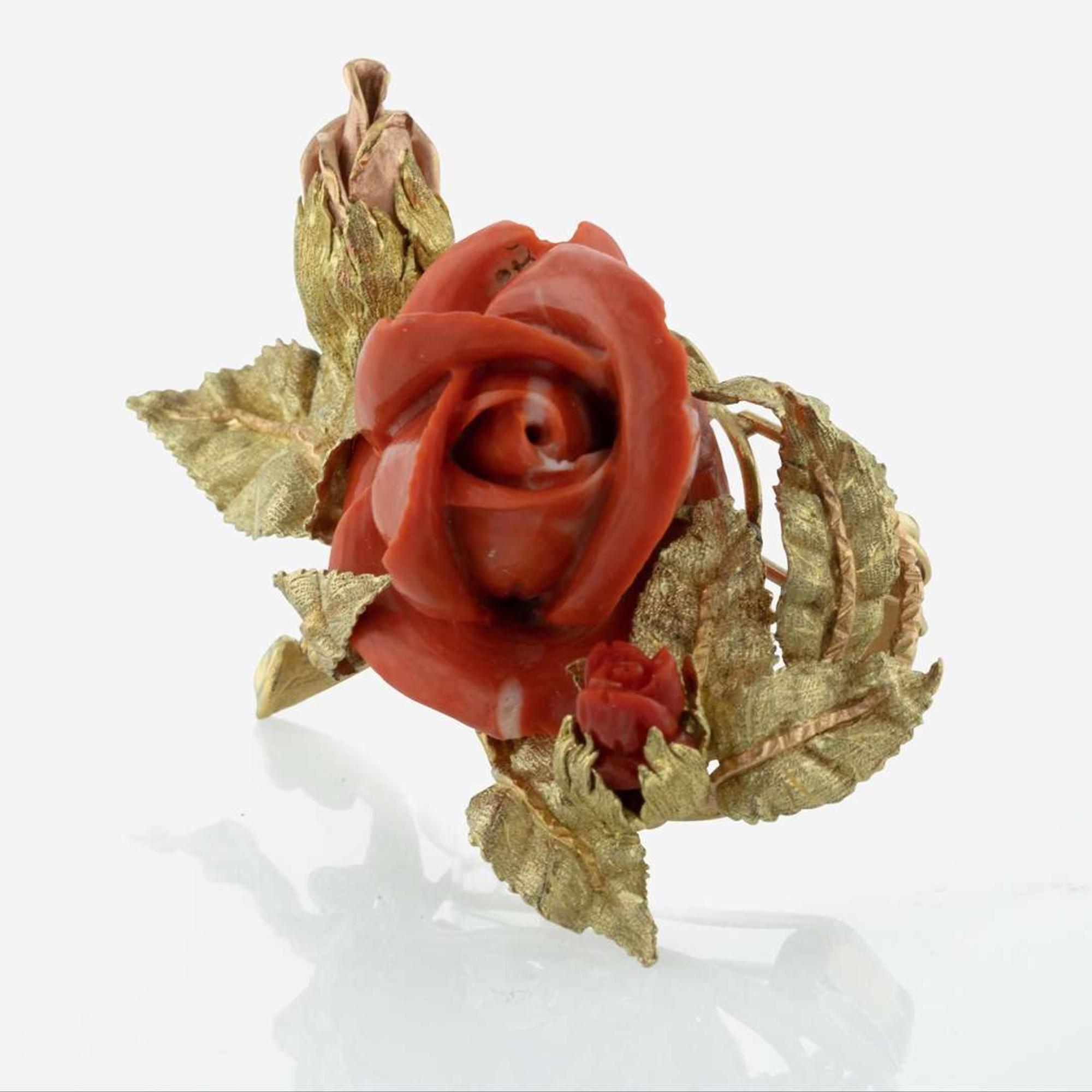 A Two-Tone Yellow and Rose Gold Carved Coral Pendant