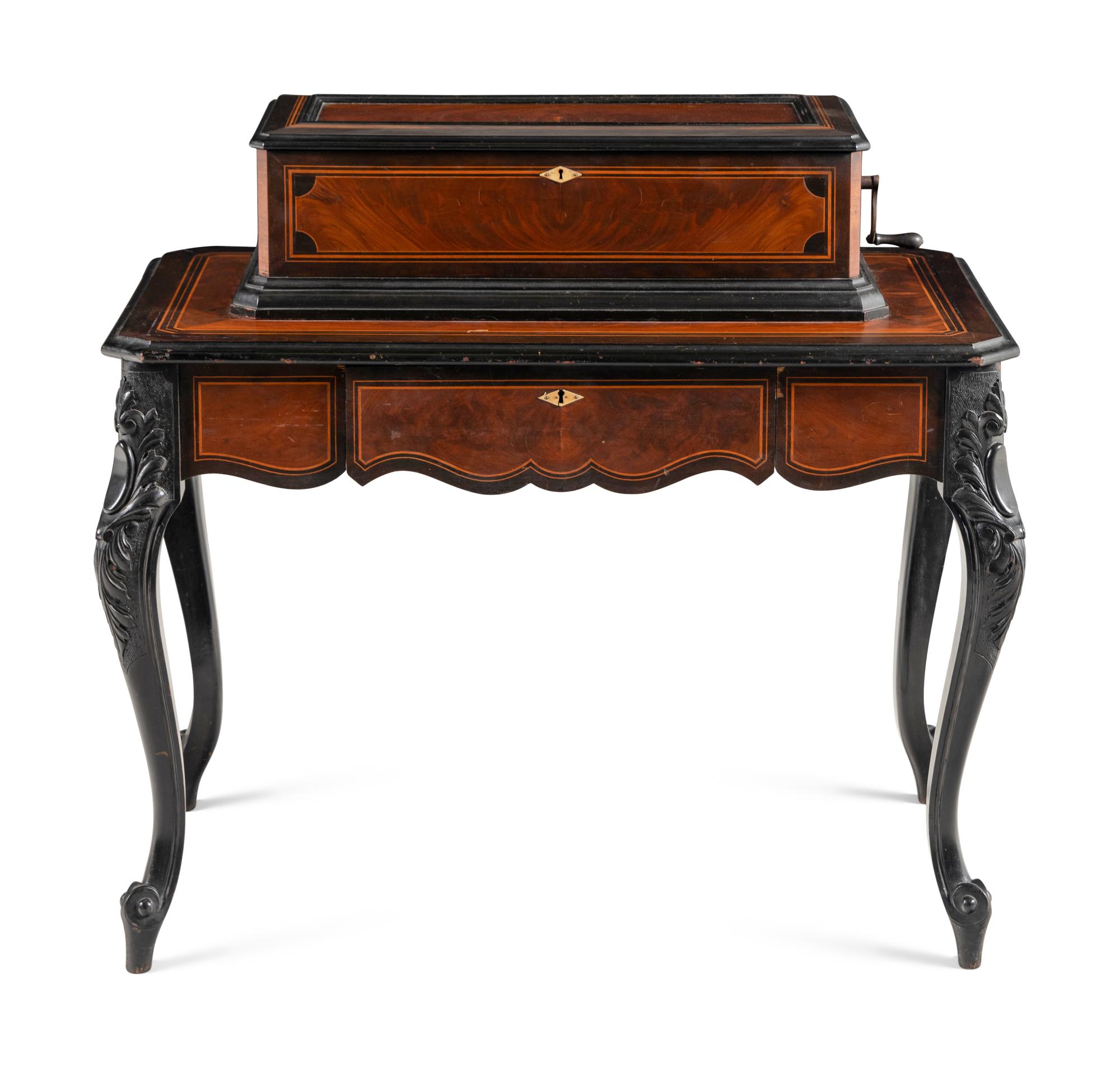 An Ideal Piccolo Music Box on Table by Mermod Frères