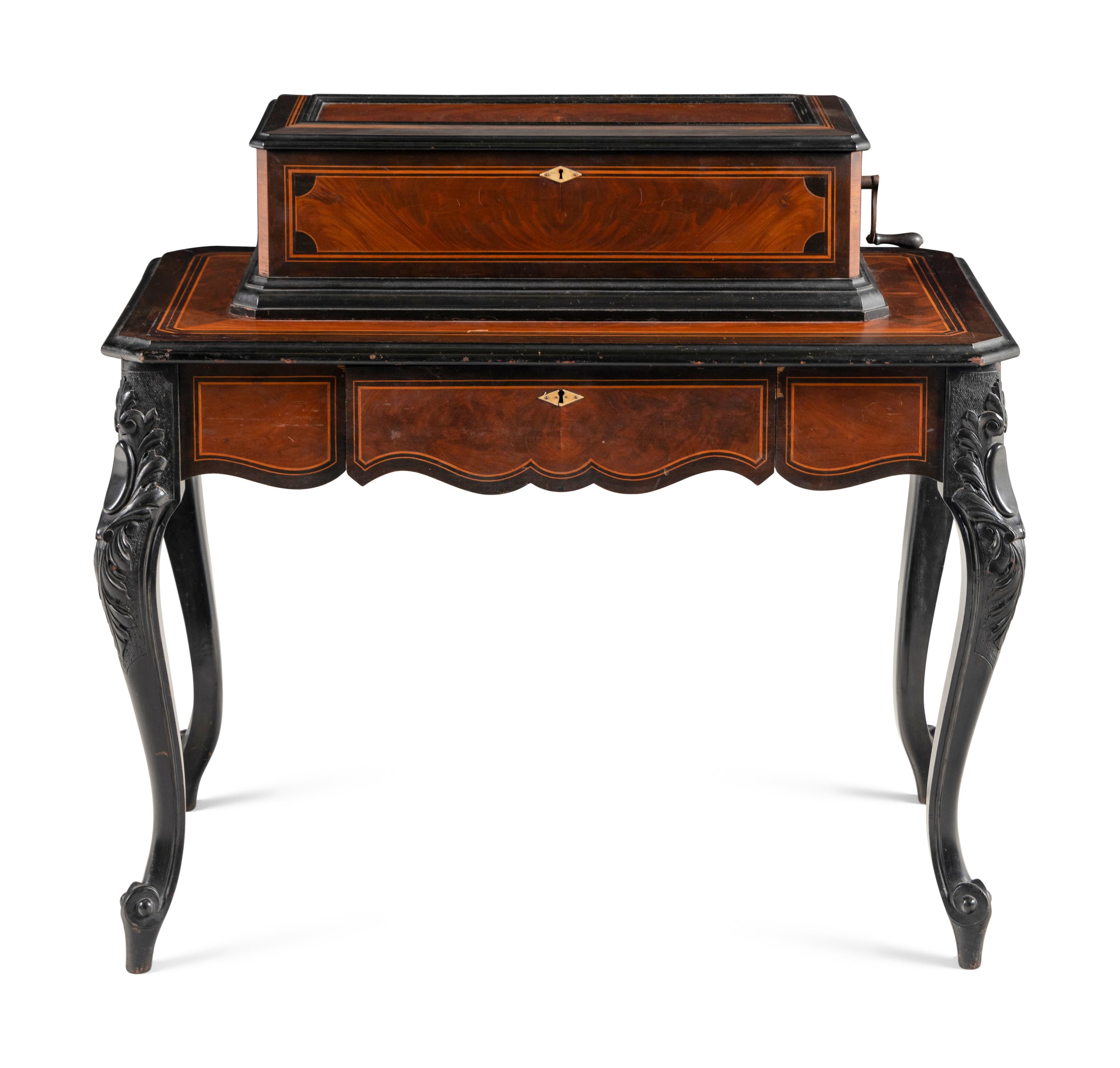 An Ideal Piccolo Music Box on Table by Mermod Frères
