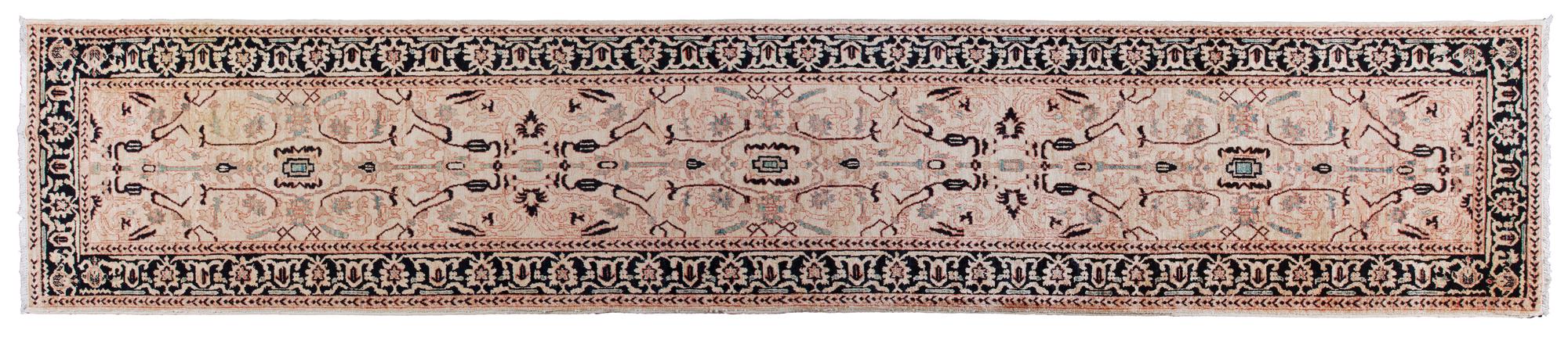 An Oriental Runner 13 feet 3 1/2 inches x 2 feet 10 1/4 inches.