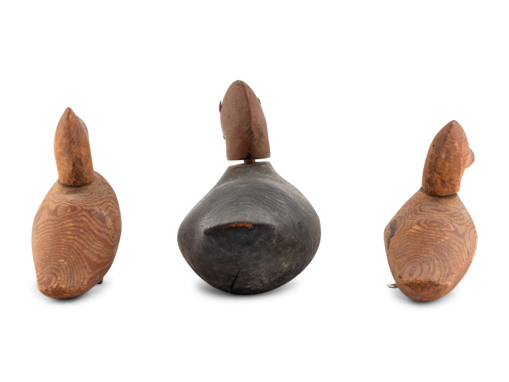 Three Diminutive Carved Wood Duck Decoys
