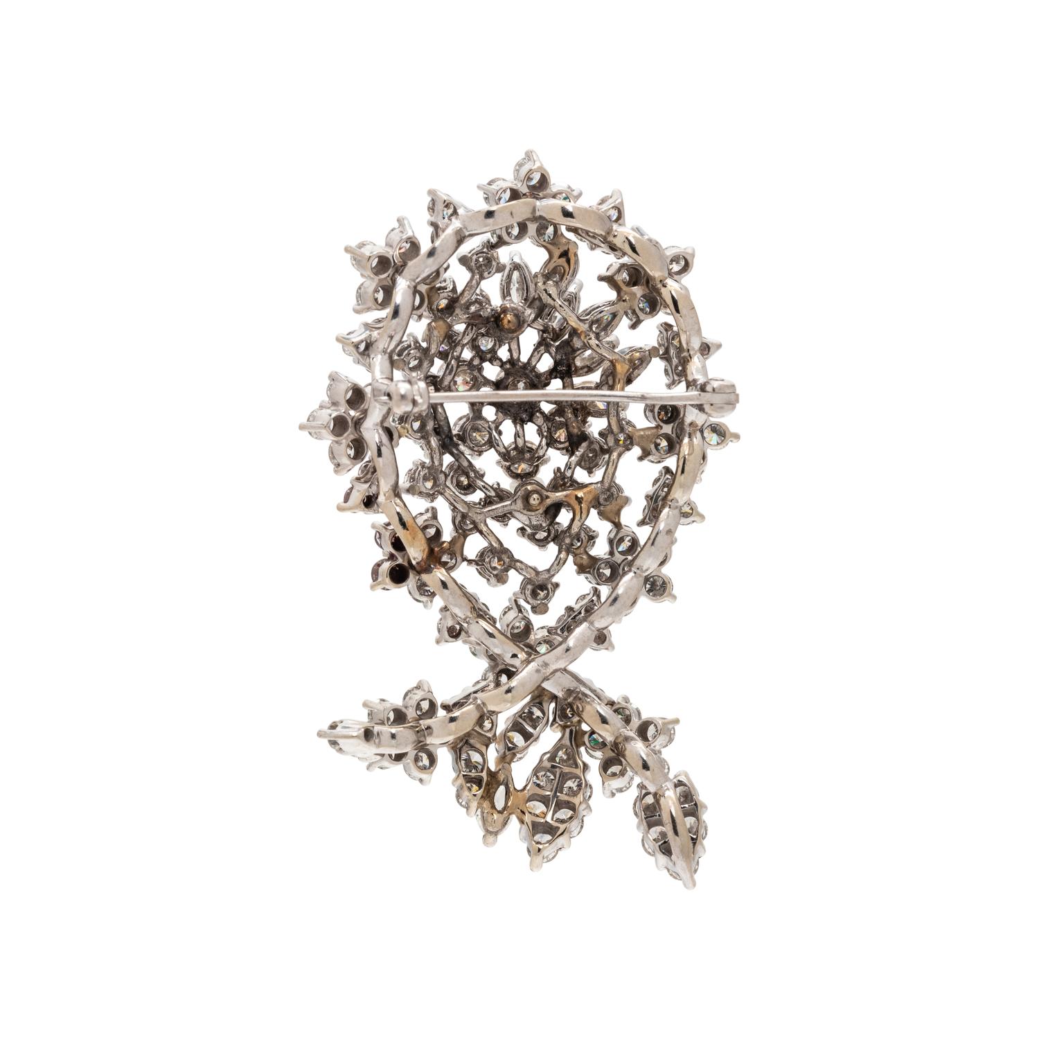 DIAMOND AND EMERALD BROOCH