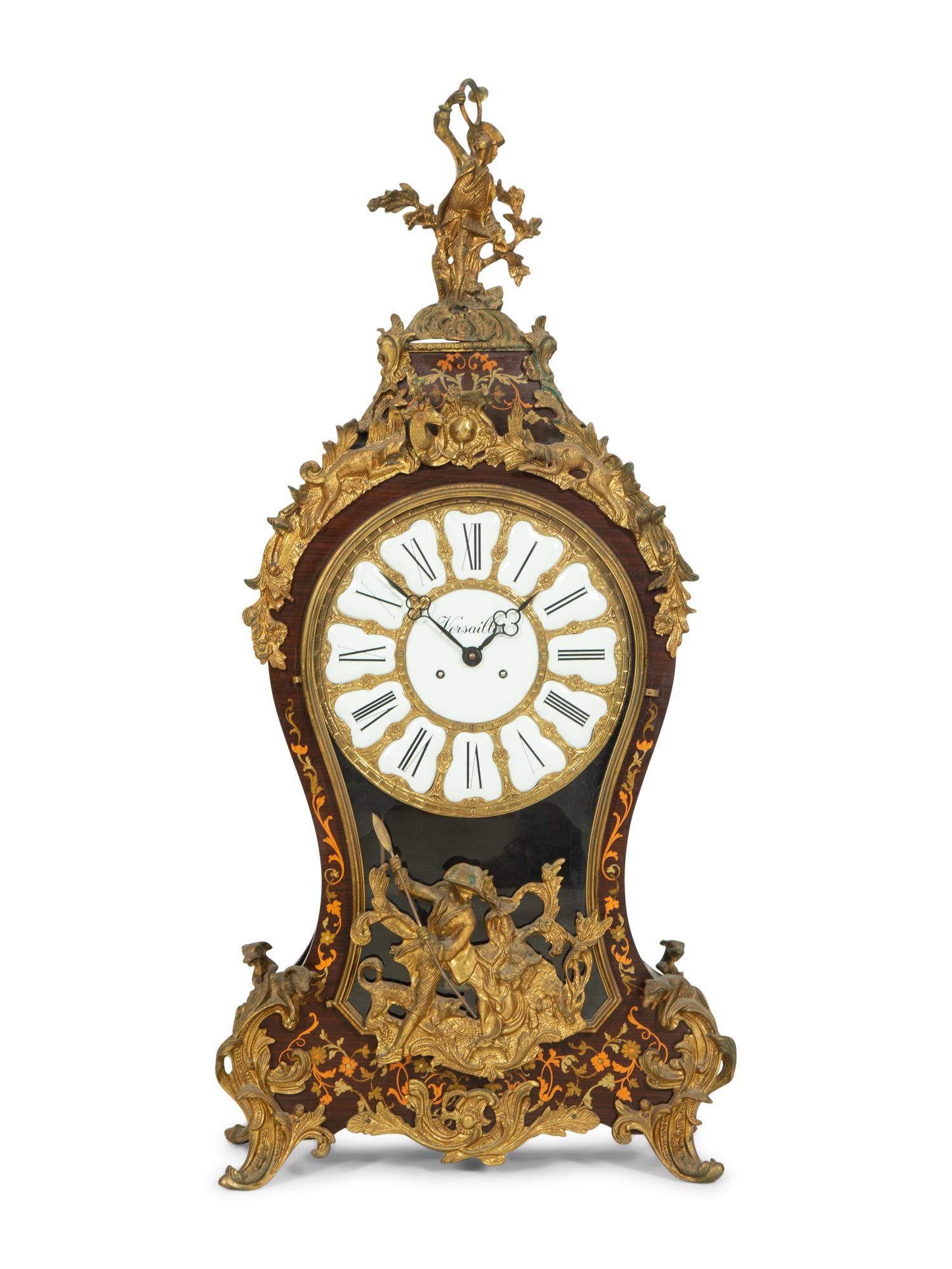 A Louis XV Style Gilt Bronze Mounted Bracket Clock