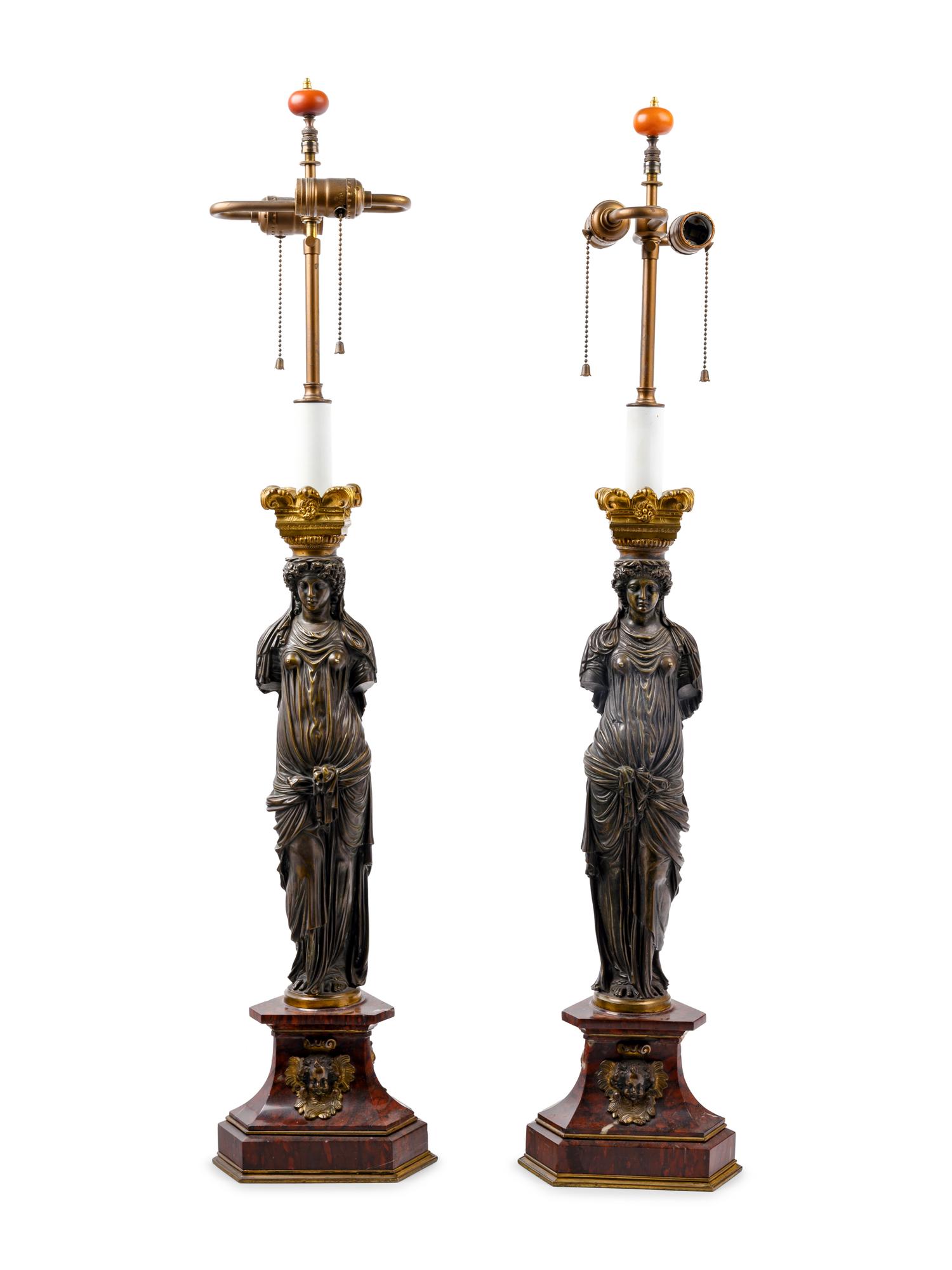 A Pair of French Neoclassical Gilt and Patinated Bronze Figural Lamps After Jean Goujon