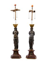 A Pair of French Neoclassical Gilt and Patinated Bronze Figural Lamps After Jean Goujon