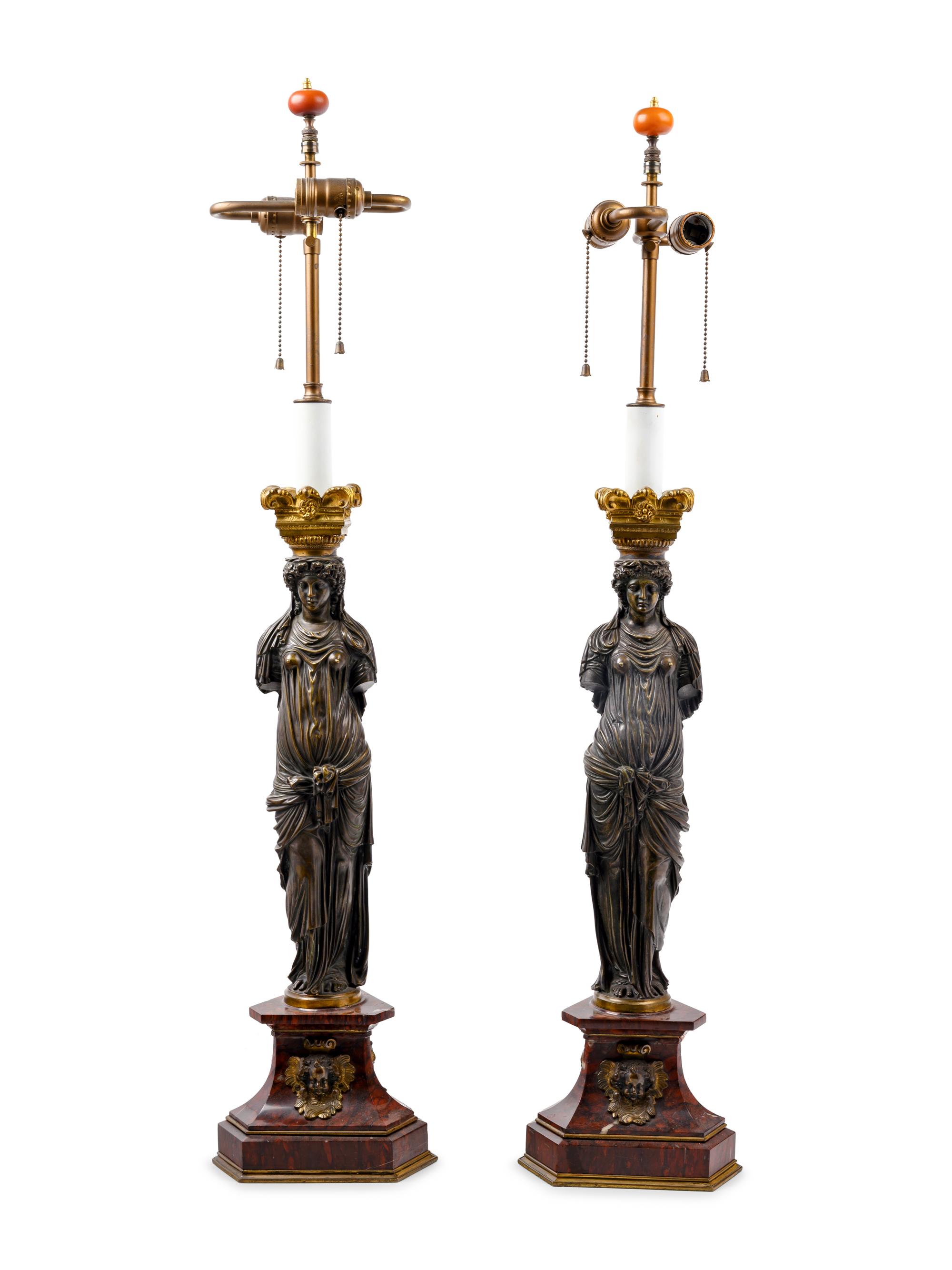 A Pair of French Neoclassical Gilt and Patinated Bronze Figural Lamps After Jean Goujon