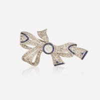 An Art Deco Platinum, Diamond, and Sapphire Brooch