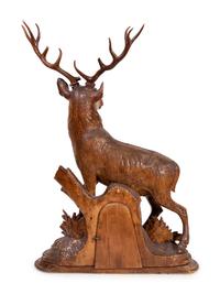 A Black Forest Carved Oak Stag-Form Mantel Clock