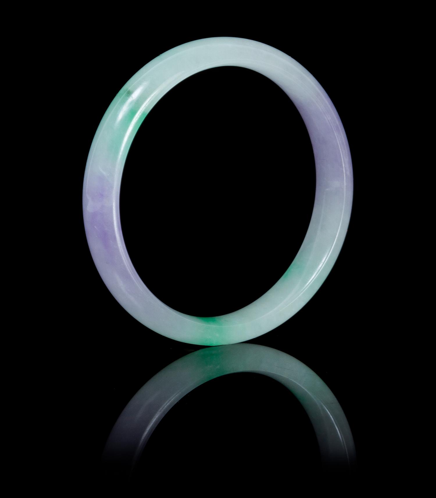 A Jadeite Bangle Diameter of interior 2 1/8 inches.