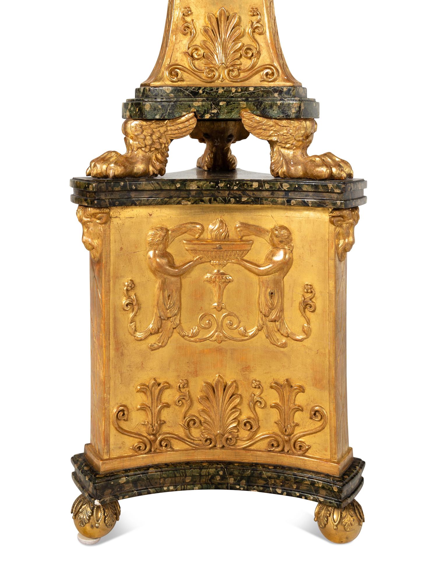 A Pair of Regency Giltwood Torchères