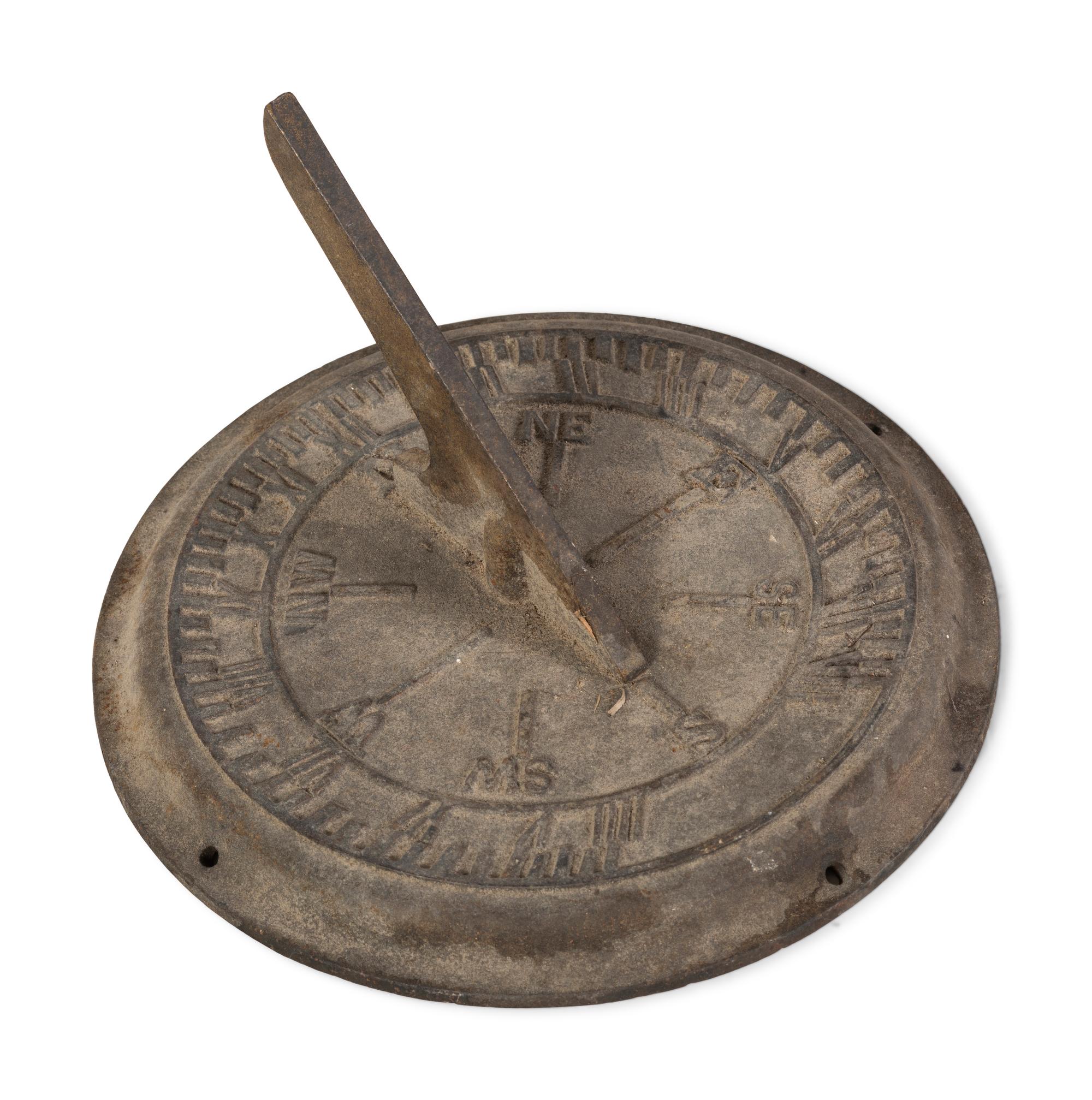 Two Cast Iron Sundials and an Architectural Element