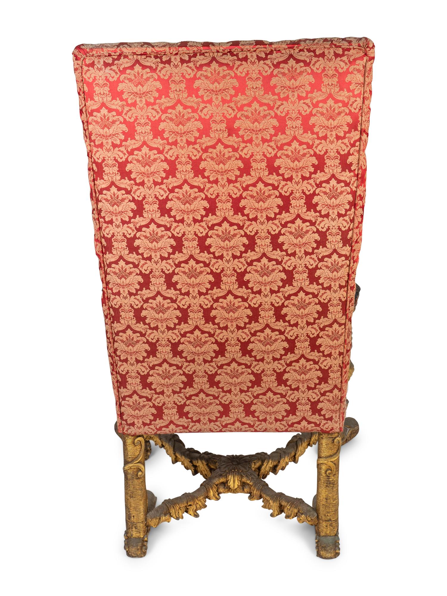 An Italian Baroque Style Carved Walnut Figural Armchair — IN THE MANNER OF ANDREA BROSTOLON, 19TH CENTURY