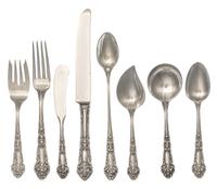 An American Silver Flatware Service, Reed and Barton, Taunton, MA, French Renaissance pattern, comprising: 10 dinner knives 5 luncheon