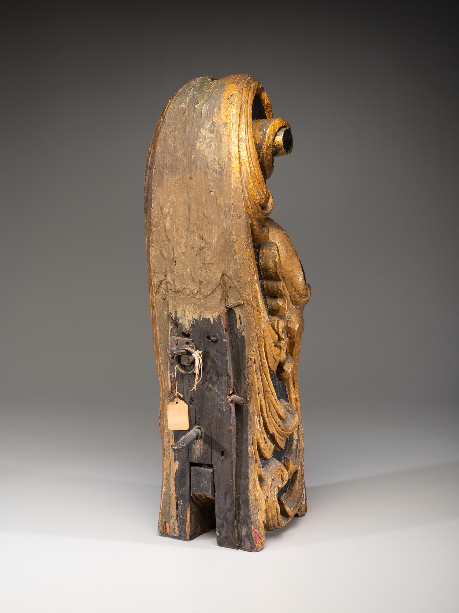 A Carved and Parcel Gilt Union Jack Mast Head