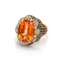 An 18 Karat Yellow Gold, Orange Sapphire, Diamond and Colored Diamond Ring, 10.50 dwts.