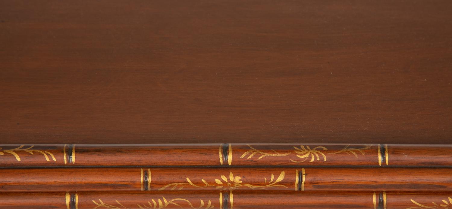 A Regency Style Mahogany and Parcel Gilt Side Table