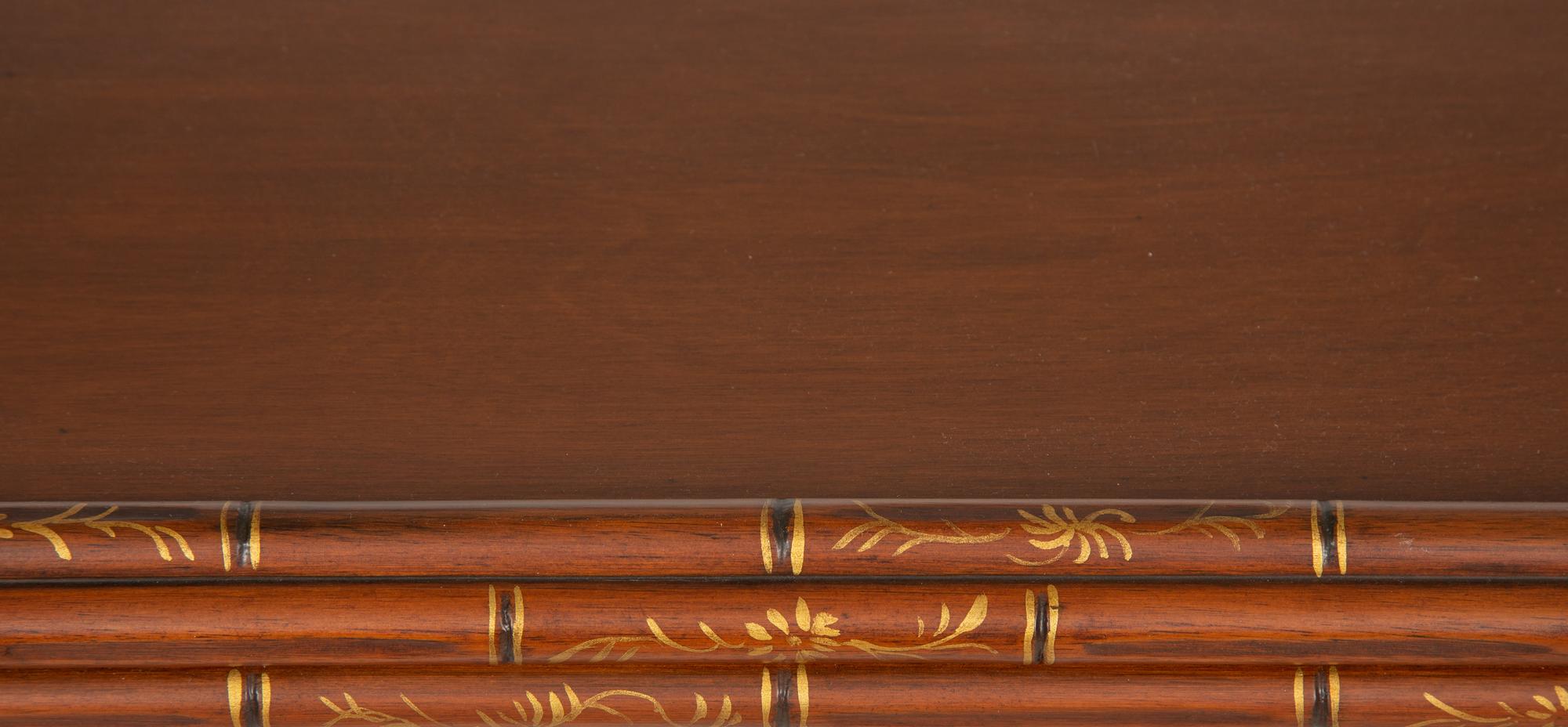 A Regency Style Mahogany and Parcel Gilt Side Table