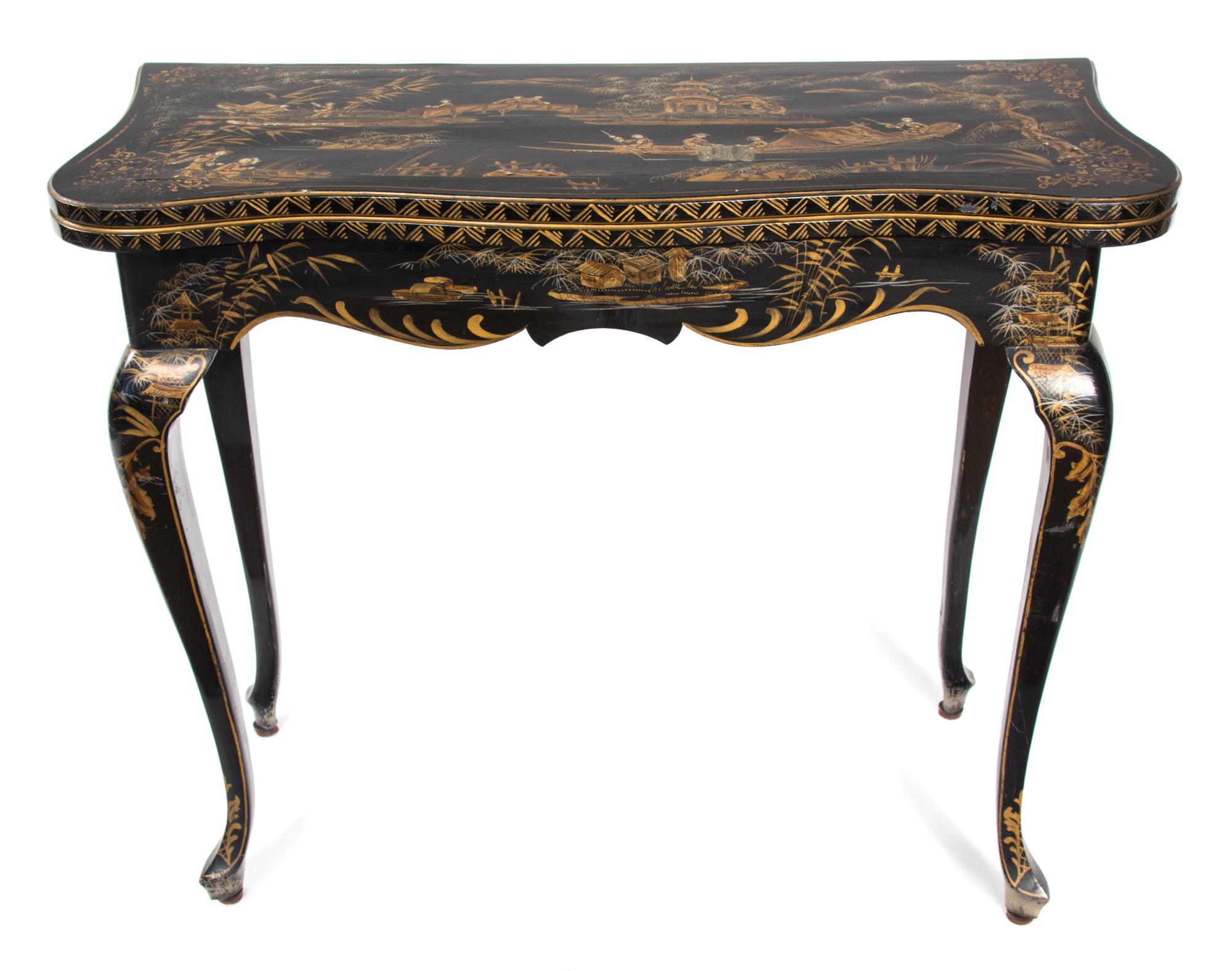 A Louis XV Style Black and Gilt Lacquered Flip-Top Card Table Height 30 x width 36 x depth 15 inches (closed). — 20TH CENTURY