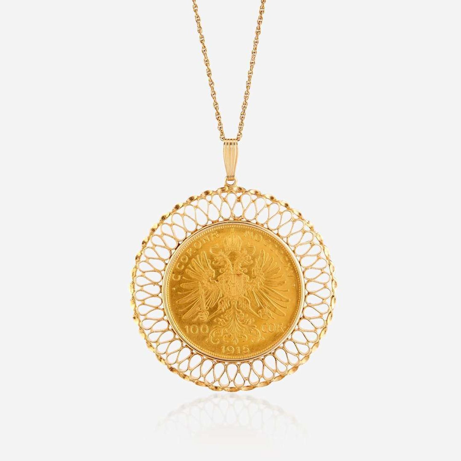 An eighteen karat gold coin pendant
