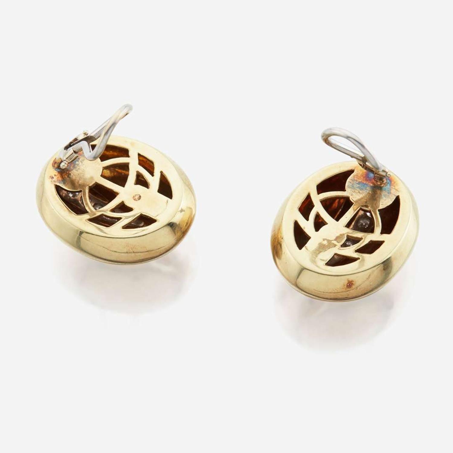 Two pairs of gold and diamond ear clips