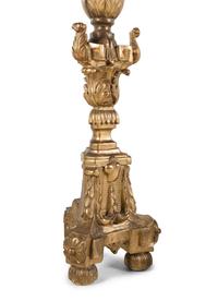 A Set of Four Continental Baroque Style Carved Giltwood Torchères